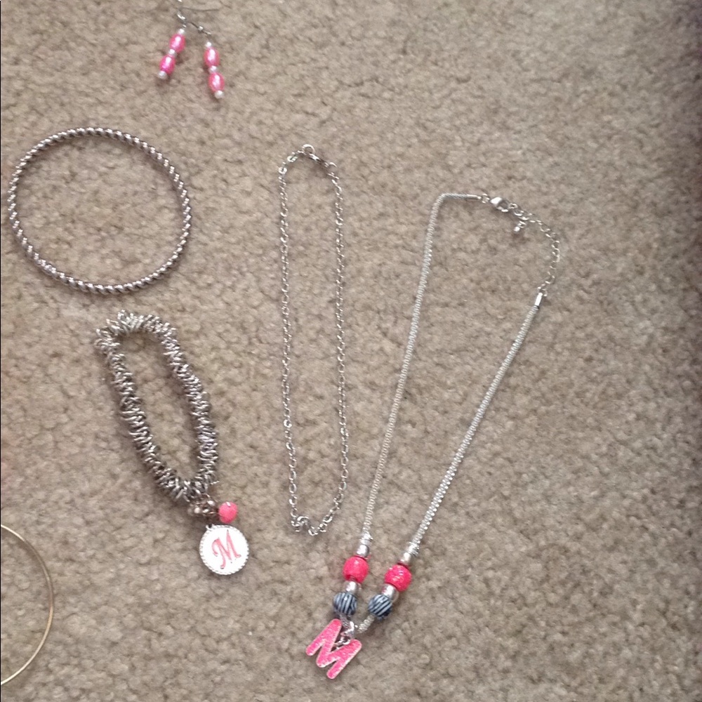 2 necklaces, 2 bracelets and 1 pair of earrings